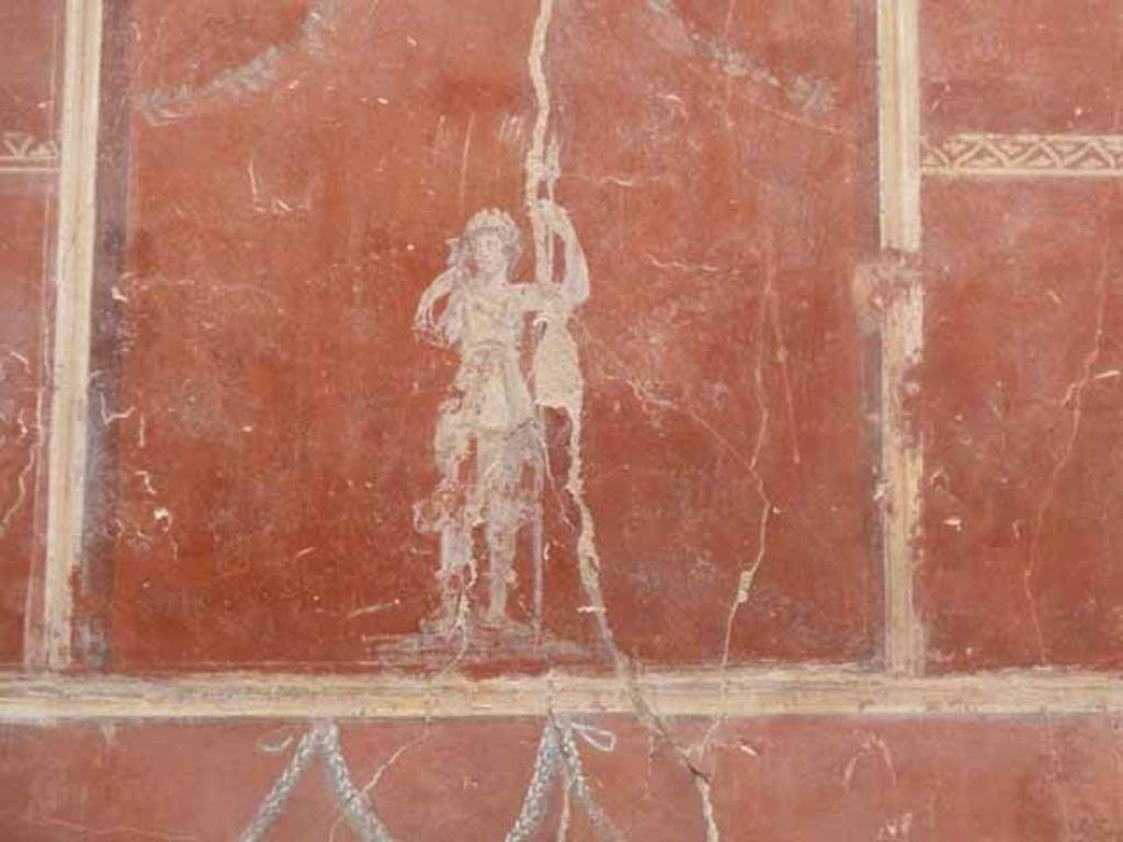IX.12.9 Pompeii. May 2010. Room 3, east wall, upper zone, centre. Painting of figure with spear.