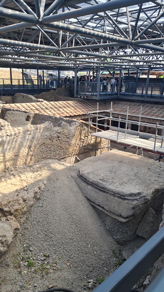 IX.12.A/IX.12.9 Pompeii. June 2024. 
Looking north-east from room 10, towards area of rooms around roofed peristyle.  
Photo courtesy of Giuseppe Ciaramella.

