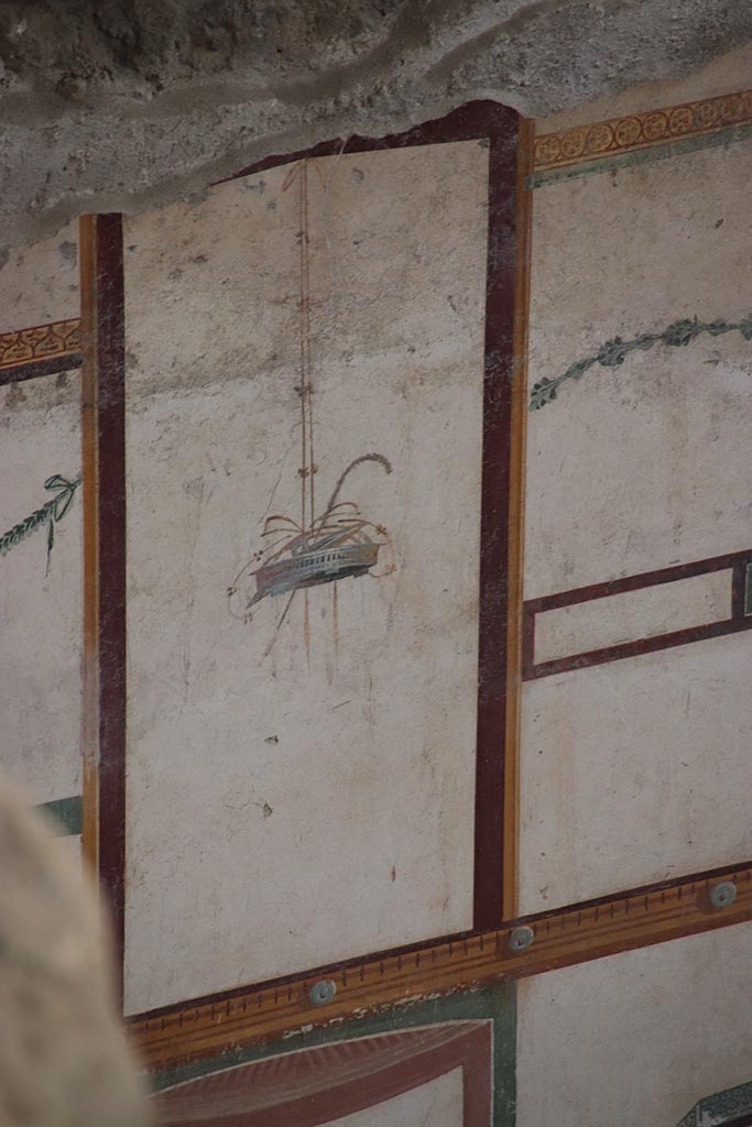 IX.12.9 Pompeii. October 2024.
Room 13, detail from upper east wall at north end. Photo courtesy of Klaus Heese.