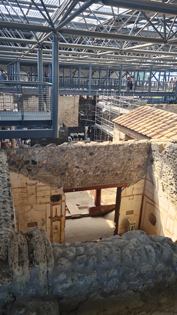 IX.12.9 Pompeii. June 2024.
Looking south towards room 13, from above. Photo courtesy of Giuseppe Ciaramella.