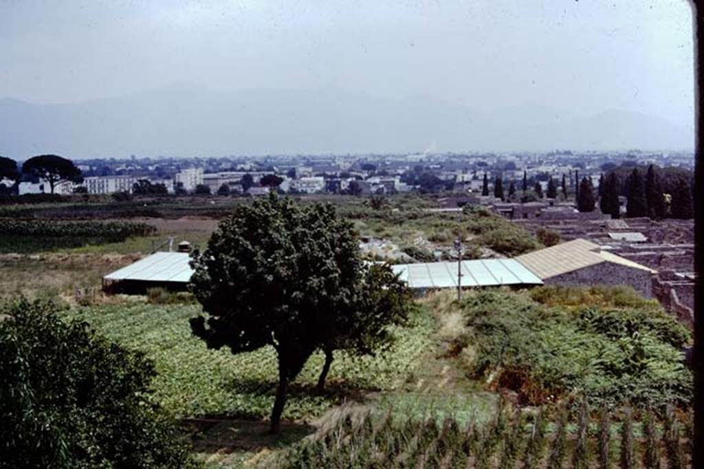 IX.13.1-3 Pompeii, 1973. Looking east from Casina dell’Aquila towards IX.13.1-3 with roof, across the top of the unexcavated IX.12. Photo by Stanley A. Jashemski.
Source: The Wilhelmina and Stanley A. Jashemski archive in the University of Maryland Library, Special Collections (See collection page) and made available under the Creative Commons Attribution-Non Commercial License v.4. See Licence and use details. J73f0239