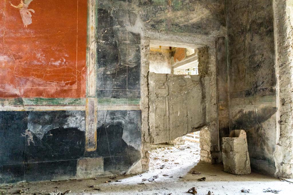 IX.13.1-3 Pompeii. October 2021. Room 13, plaster cast of door in south-east corner. Photo courtesy of Johannes Eber.