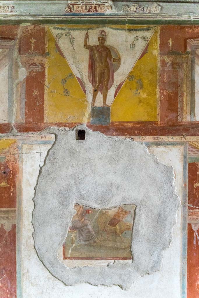 IX.13.3 Pompeii. October 2021.
Room 17, central panels of east wall. Photo courtesy of Johannes Eber.
