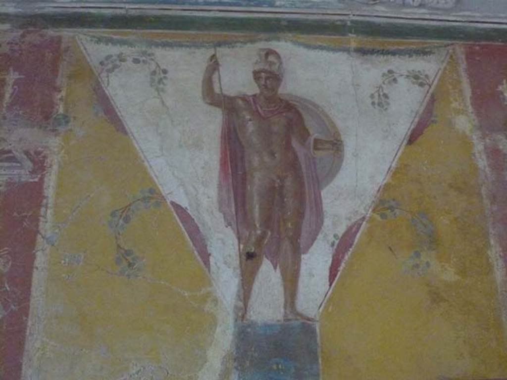 IX.13.1-3 Pompeii. May 2012. Room 17, painted figure on upper east wall. Photo courtesy of Buzz Ferebee.