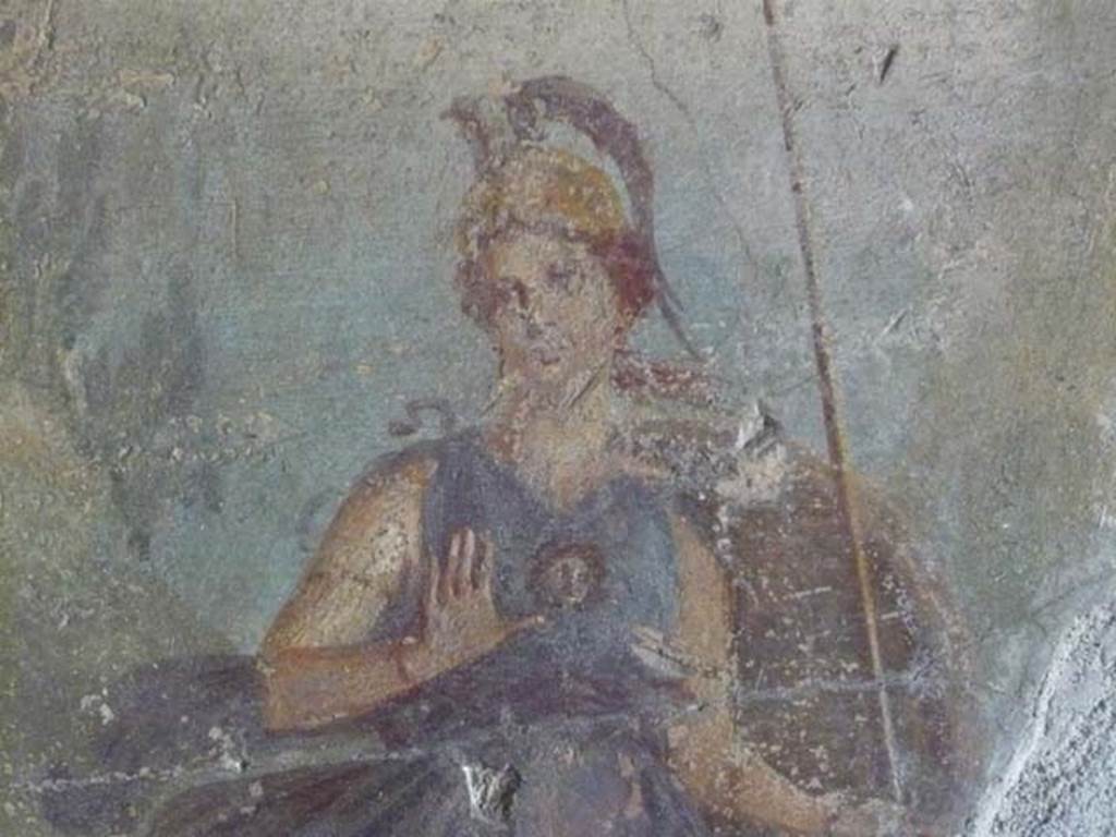 IX.13.1-3 Pompeii. May 2012. Room 17, detail of Minerva from mythological wall painting on west wall. Photo courtesy of Buzz Ferebee.