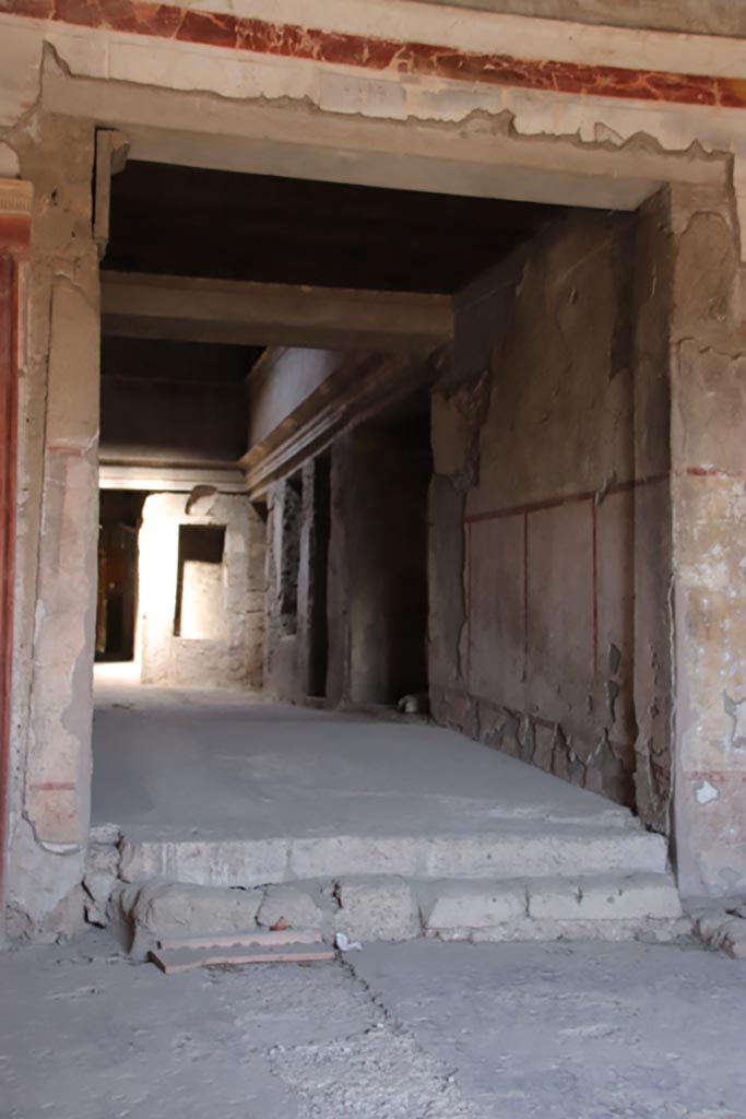 IX.13.1-3 Pompeii. October 2022.
Room 1, looking north towards east wall of room 28. Photo courtesy of Klaus Heese.