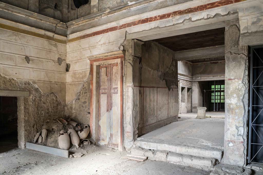 IX.13.3 Pompeii. October 2021.
Room 1, looking towards north-west corner, on left, and room 28 leading to atrium, room 2, on right. Photo courtesy of Johannes Eber.