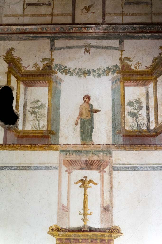 IX.13.1-3 Pompeii. October 2021.
Room 11, detail from south end of east wall. Photo courtesy of Johannes Eber.
