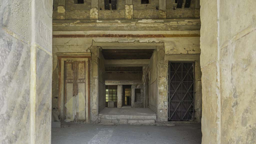 IX.13.1-3 Pompeii, August 2021.
Room 1, looking north from entrance doorway towards room 28, in centre. Photo courtesy of Robert Hanson.