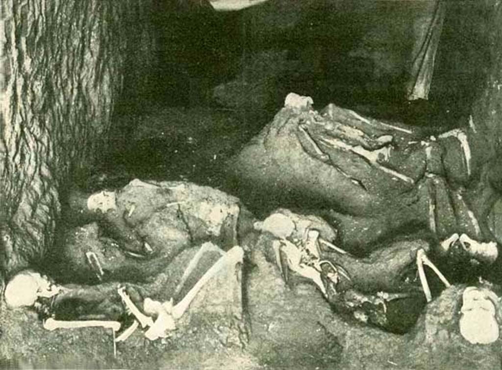 IX.14.2 Pompeii. 1912. Human skeletons in the fauces.
According to New York Times, March 13th, 1912; -
“before one of the gates were lying six bodies – those of Obellius Firmus himself, his wife, two little children, and two other persons, probably slaves”.