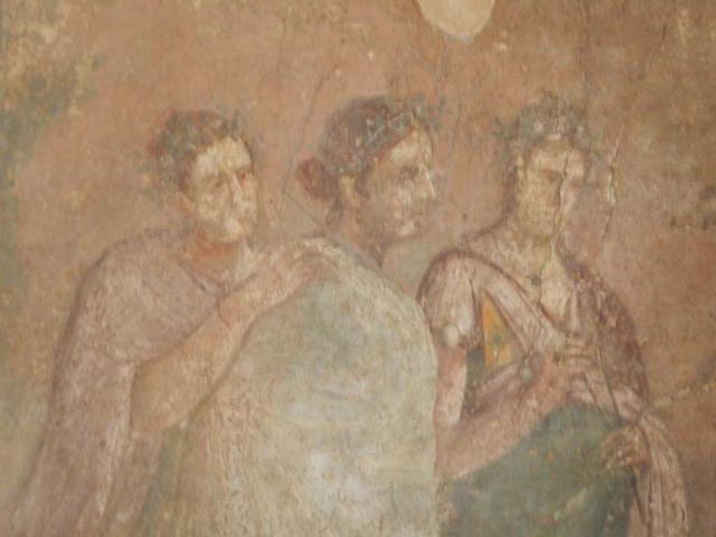 IX.14.4 Pompeii. May 2017. Room 3, detail of three women from central painting on south wall. Photo courtesy of Buzz Ferebee.