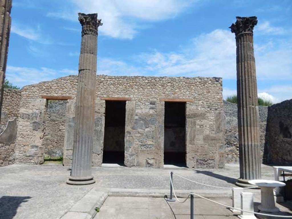 IX.14.4 Pompeii. May 2017. Doorways to rooms C, E, F, and G, on east side of atrium.
Photo courtesy of Buzz Ferebee.