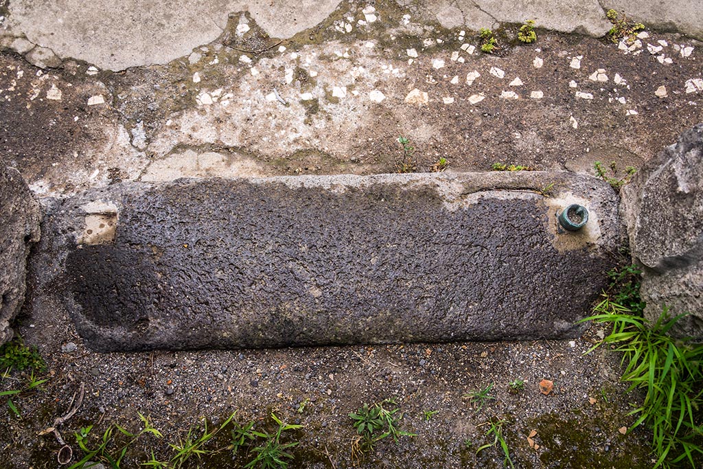 IX.14.4 Pompeii. July 2024. Room 30, lava threshold. Photo courtesy of Johannes Eber.

