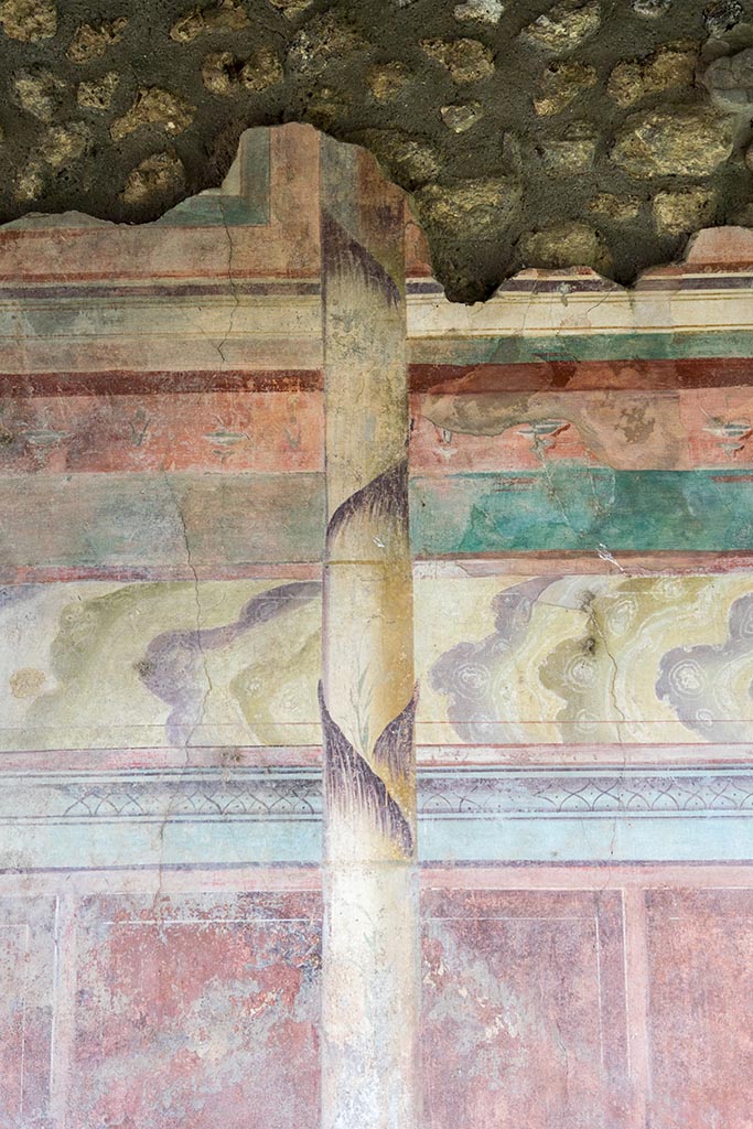 IX.14.4 Pompeii. July 2024. 
Tablinum, detail of painted decoration on east wall. Photo courtesy of Johannes Eber.
