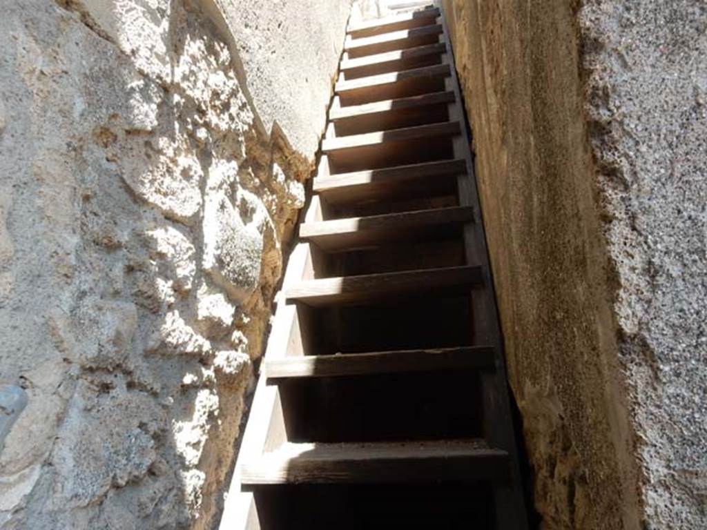 IX.14.4 Pompeii. May2017. Modern reconstruction of wooden stairs to upper floor, numbered 35. Photo courtesy of Buzz Ferebee.