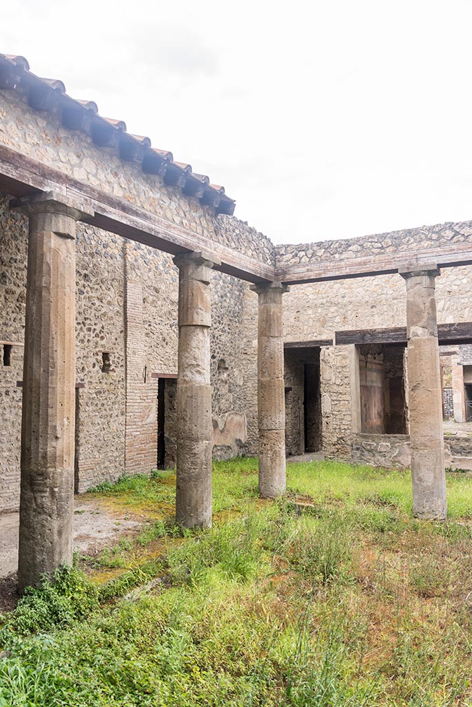 IX.14.4 Pompeii. July 2024.
Looking towards west portico and north-west corner of peristyle 1. Photo courtesy of Johannes Eber.