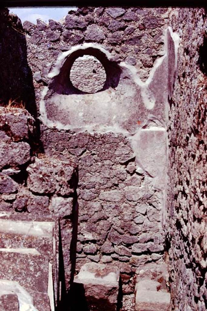 IX.14.4 Pompeii, 1978. Looking east across room 8 towards circular window above latrine. Photo by Stanley A. Jashemski.
Source: The Wilhelmina and Stanley A. Jashemski archive in the University of Maryland Library, Special Collections (See collection page) and made available under the Creative Commons Attribution-Non Commercial License v.4. See Licence and use details. J78f0222