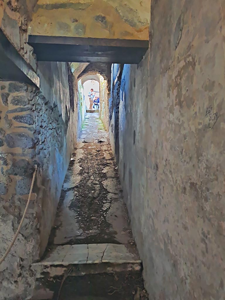 HGW24 Pompeii. March 2024.
Looking east along corridor 5,12 towards upper floor, in north-east corner of portico.
Photo courtesy of Giuseppe Ciaramella.
