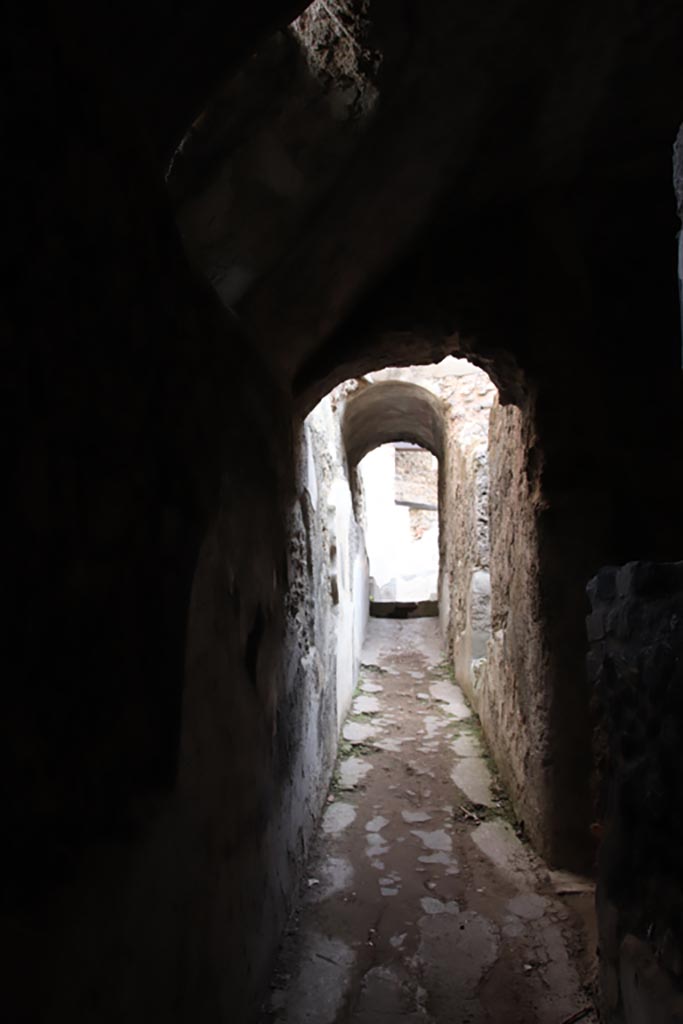 Villa of Diomedes, Pompeii. October 2023.
Looking east along corridor 5,12 in north-east corner of portico. Photo courtesy of Klaus Heese.