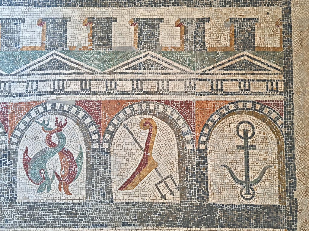 Villa of Diomedes ? or VI 17.10 Pompeii ?. June 2024.
Detail from mosaic of “doors”, starting with two dolphins, a trident and an anchor.
On display in Naples Archaeological Museum, Room CXXXIV. Photo courtesy of Giuseppe Ciaramella.
