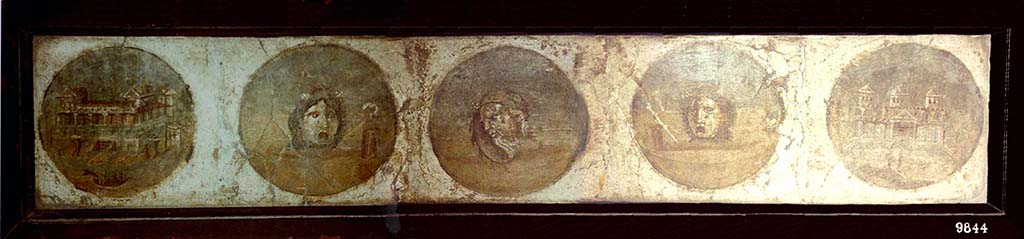 HGW24 Pompeii. Fresco with medallions with theatre masks and seaside villas, cut separately from the walls.
Now in Naples Archaeological Museum. Inventory number 9844.
According to Pagano and Prisciandaro, and to the plan of La Vega, these may have come from either of the areas shown as nos. 2 or 3 on the plan by La Vega.
(Fontaine room 2.6).