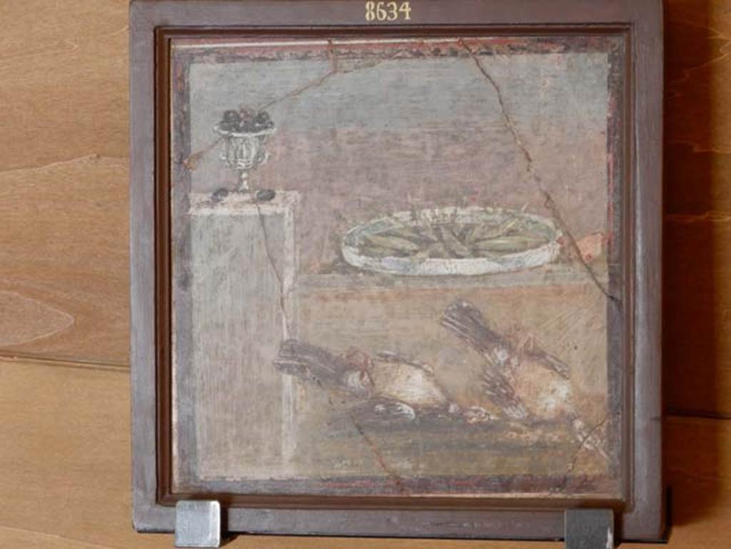 HGW24 Pompeii. May 2016. Painting of two pots filled with fruit and two dead birds, found 9th March 1771.
Now in Naples Archaeological Museum, inventory number 8634. Photo courtesy of Buzz Ferebee.
Foodstuffs%20exhibit%20Ferebee%20May%202016%20DSCN8252