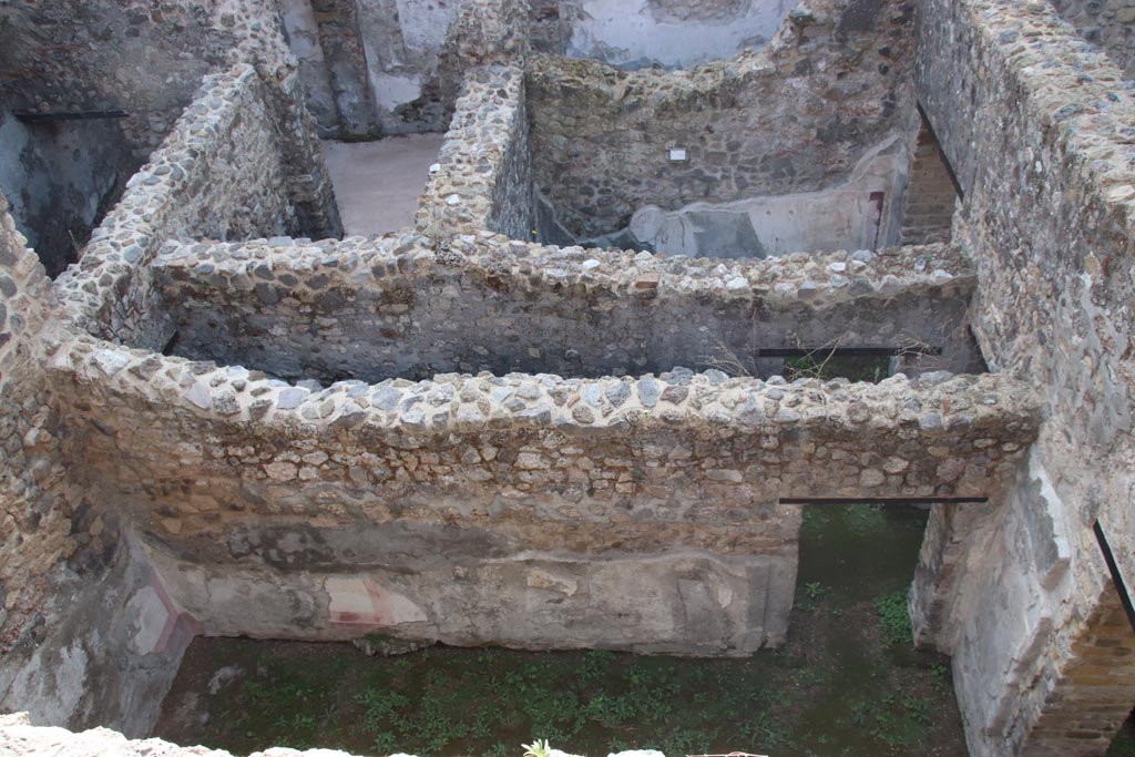 HGW24 Pompeii. Villa of Diomedes. October 2023.
Looking south, down onto lower area to south of terrace. Photo courtesy of Klaus Heese.
(Fontaine, looking across rooms (from upper left) 5,4, stairs to lower floor, rooms 5,1 and 5,4, upper centre.
In centre - corridor 5,3, and south wall of room 5,5, on lower side.