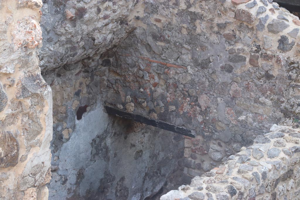 HGW24 Pompeii. Villa of Diomedes. October 2023.
Looking south-east towards corridor at side of steps, leading to room on south side of lower area. Photo courtesy of Klaus Heese.