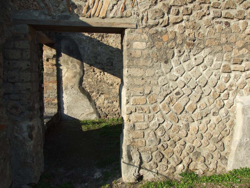 HGW24 Pompeii. December 2006.
Doorway to room (diaeta, or garden room) at north end of terrace. (see No.4 below, on the plan by La Vega).
According to PAH, this room’s walls were painted yellow, and the floor was simple polished white mosaic.
The paintings that decorated the walls (of both rooms 3 and 4 (La Vega’s plan) were Views, Fruit and Birds, Satyr with Bacchante, Arianna, Narcissus, flying cupids carrying various things. Medallions with masks and views of landscape. Animals.
(Villa Diomedes Project – area 40).
(Fontaine, room 4,1, see also previous room 4,2 for paintings).