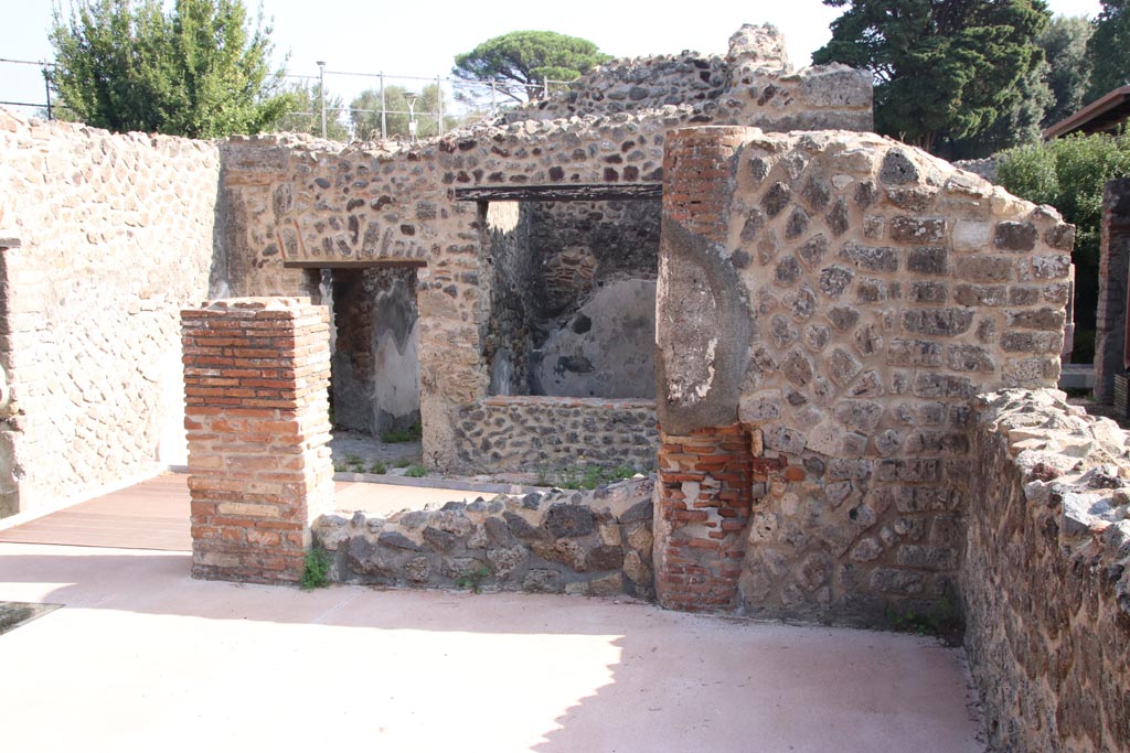HGW24 Pompeii. Villa of Diomedes. October 2023.
Looking east across terrace A, through doorway onto terrace with doorway to corridor and window into room at north end of terrace.
Photo courtesy of Klaus Heese.
