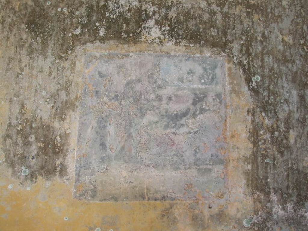 HGW24 Pompeii. December 2006.
Remains of wall painting in centre of east wall of one of the richly decorated living rooms on the eastern side of the garden.
(Fontaine, room 5,7).