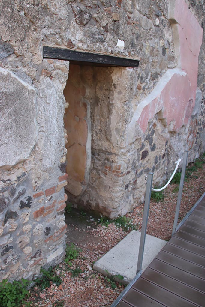 HGW24 Pompeii. Villa of Diomedes. October 2023.
Doorway to baths complex in east wall of peristyle. Photo courtesy of Klaus Heese.