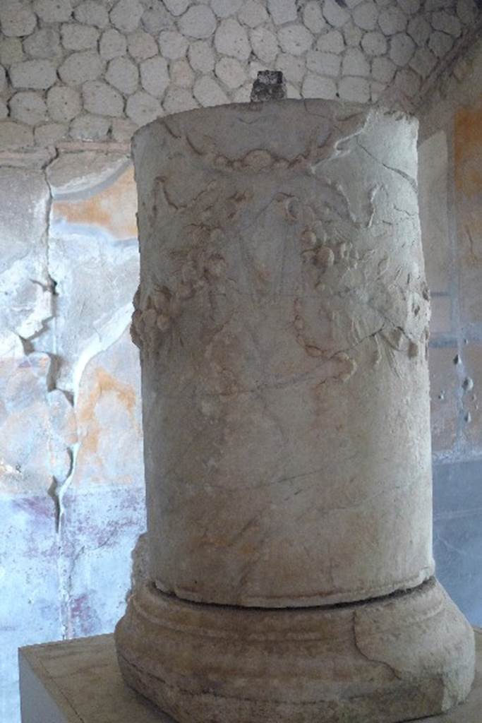 Villa San Marco, Stabiae, July 2010.
Restored marble altar, decorated with garlands and ribbons, supported by stags heads.
Photo courtesy of Michael Binns.