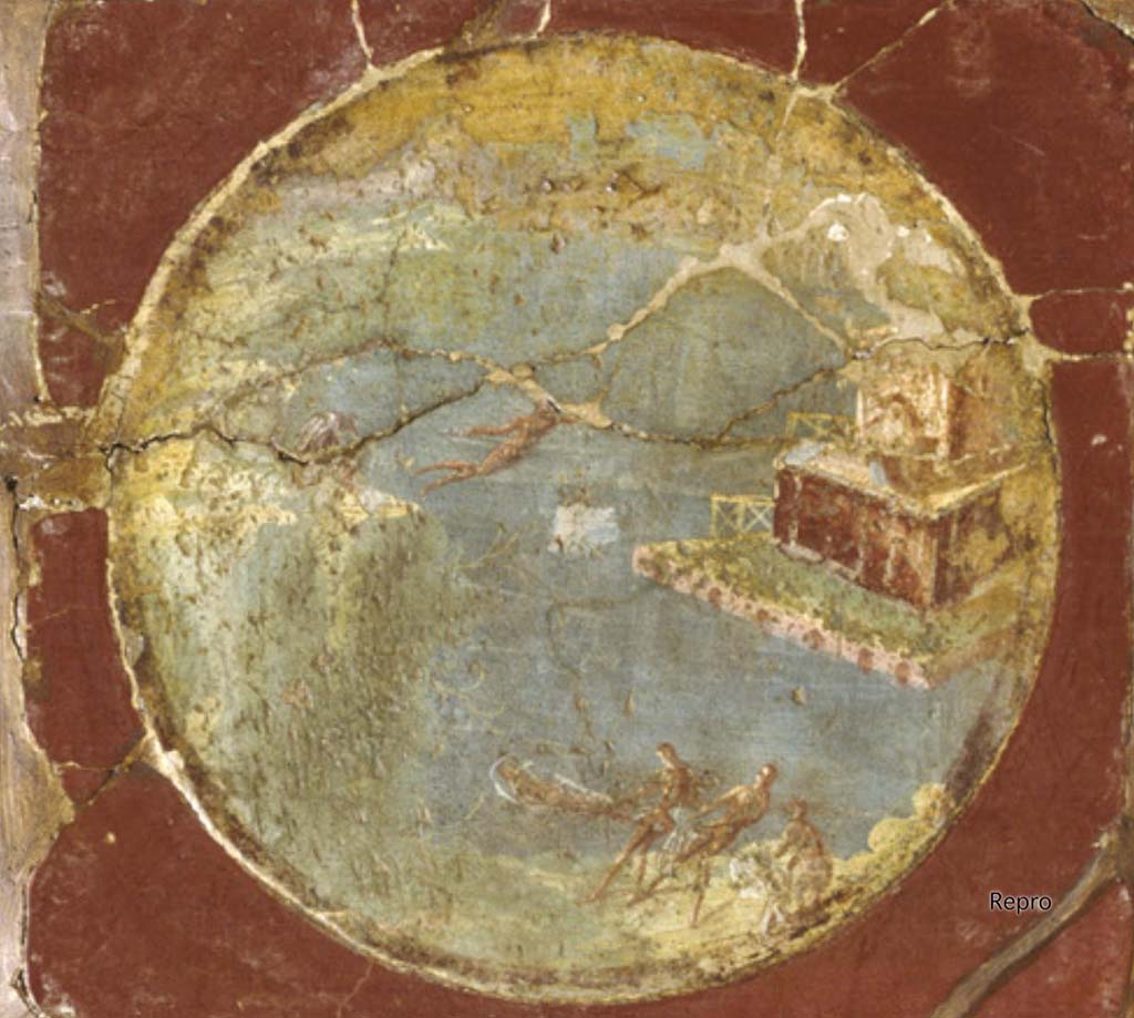 Villa San Marco, Stabiae, Room 3, west wall, medallion from the wall of the portico.
Original is one of four parts now in Naples Archaeological Museum, as inventory number 9501.
DAIR Repro_609729. Photo © Deutsches Archäologisches Institut, Abteilung Rom, Arkiv.
Three fishermen pulling a net occupy the foreground of the medallion, which also shows a building built on an arcaded base and represented at an angle.
Above a colonnade there is a narrower storey.
See Barbet A. (a cura di), 1999. La Villa San Marco di Stabia. Roma, L’Erma di Bretschneider, p. 207.