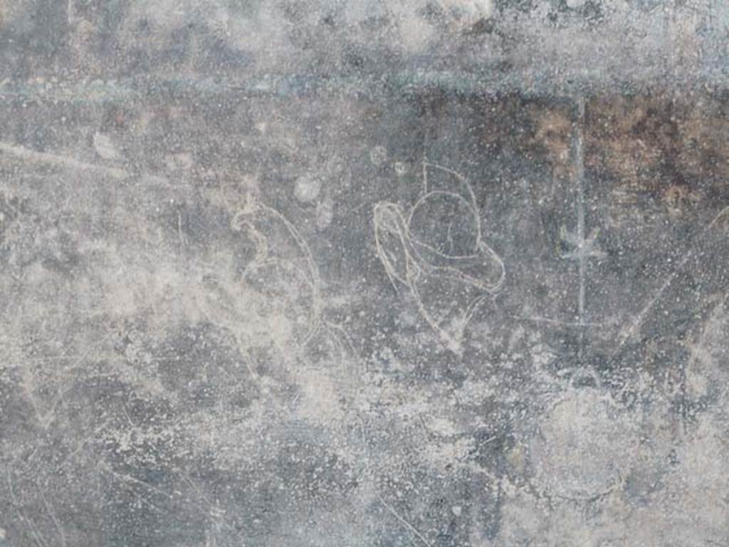 Villa San Marco, Stabiae, 2010. Room 3, west portico, south-west wall, at the end near the ramp 4.
Graffiti of two gladiators helmets with visors. Photo courtesy of Buzz Ferebee.
See Barbet A. (a cura di), 1999. La Villa San Marco di Stabia: Testa. Roma, L’Erma di Bretschneider, no. 84, p. 358, fig. 734.