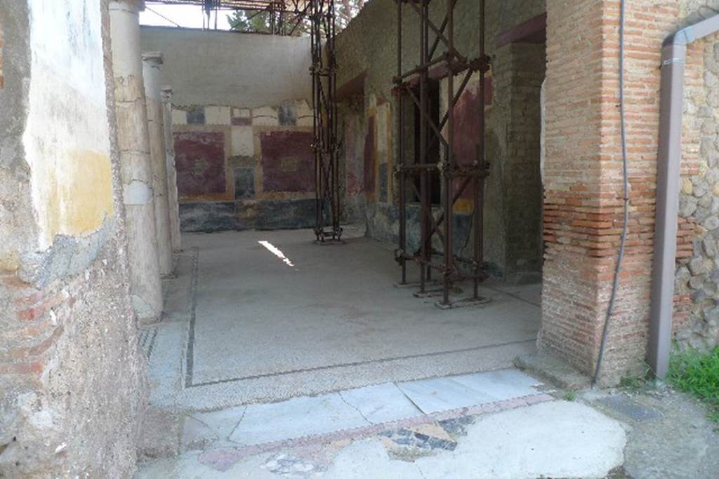 Villa San Marco, Stabiae, July 2010.
Looking west along room 5, the north portico to west portico 3, from south end of the pool.
Photo courtesy of Michael Binns.