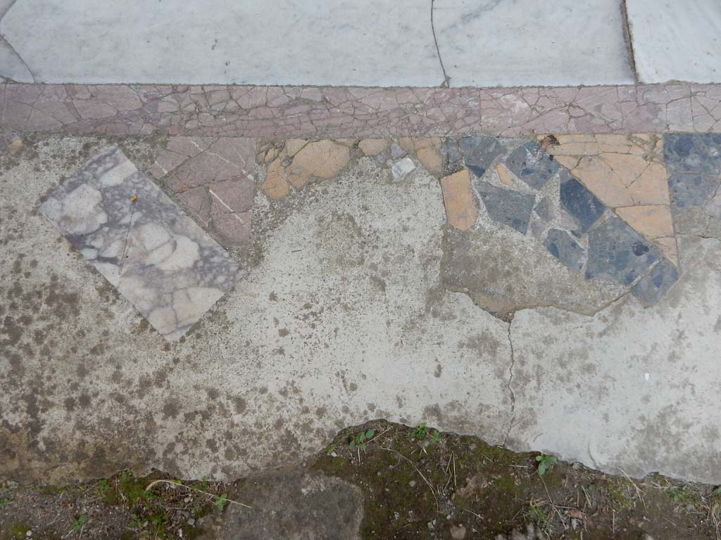 Villa San Marco, Stabiae, June 2019. Looking west at doorway threshold to north portico 5, from south end of pool.
Photo courtesy of Buzz Ferebee
