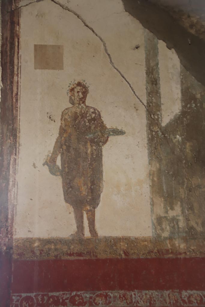 Villa San Marco, Stabiae, October 2022.
Room 8, detail of figure to right of window in east wall. Photo courtesy of Klaus Heese.