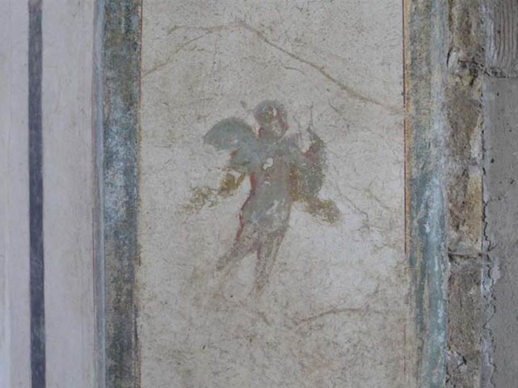 Villa San Marco, Stabiae, 2010. Room 12, south-west end. Floating figure by side of door.
Photo courtesy of Buzz Ferebee.