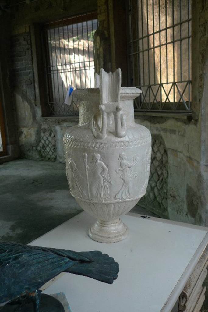 Castellammare di Stabia, Villa San Marco, July 2010. Room 12. Reproduction of marble crater, found and reported on 8th April 1752. This was found at the east end of the nymphaeum in room 64. Photo courtesy of Michael Binns. The original is in the Naples Archaeological Museum. Inventory number 6779. See Pagano, M. and Prisciandaro, R., 2006. Studio sulle provenienze degli oggetti rinvenuti negli scavi borbonici del regno di Napoli. Naples : Nicola Longobardi. (p.239)
According to Parslow, this is decorated with reliefs of Pan and eight maenads dancing around the vase. See Parslow, C.C. (1998). Rediscovering Antiquity: Karl Weber and the Excavation of Herculaneum, Pompeii and Stabiae. UK,Cambridge UP (p.178, & p.180, fig 51)