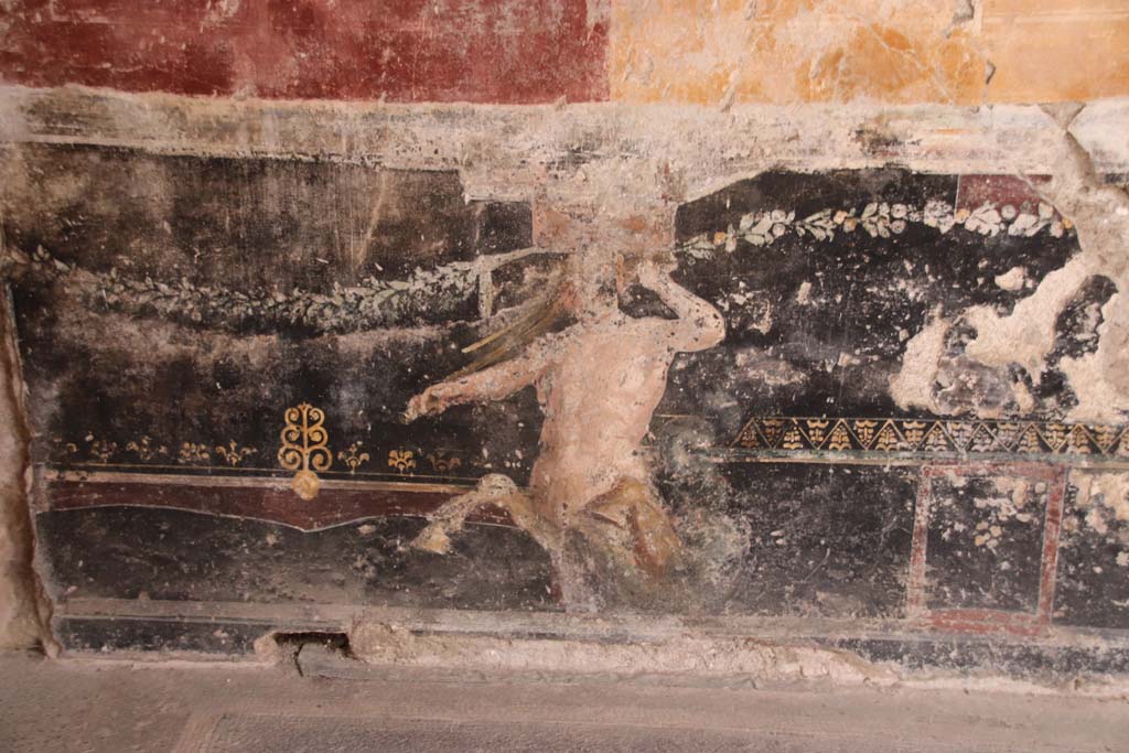 Villa San Marco, Stabiae, September 2019. Room 44, detail of painted centaur on zoccolo of west wall of atrium in south-west corner.
Photo courtesy of Klaus Heese.