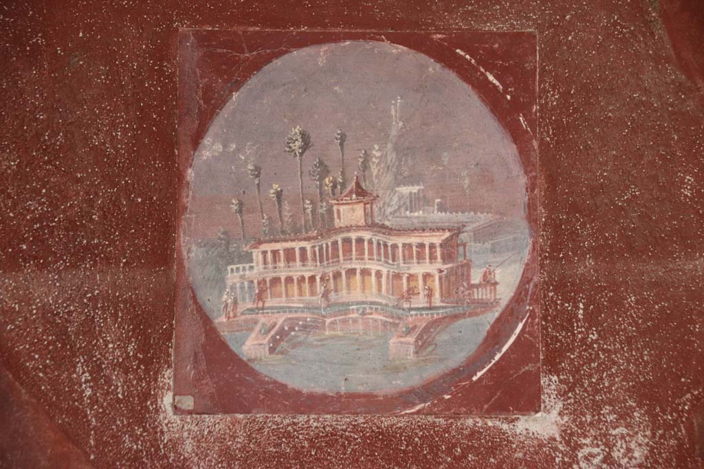 Villa San Marco, Stabiae, September 2021.
Room 20, east wall, reproduction of medallion with a painted maritime villa. Photo courtesy of Klaus Heese.