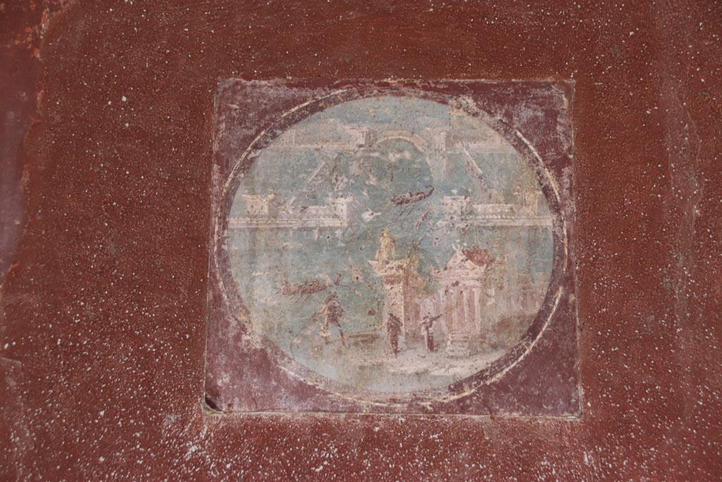 Villa San Marco, October 2022. Room 20, reproduction of medallion from east wall, (to the right of the hole in the wall).
(original now in Naples Archaeological Museum, inventory number 9408A.) Photo courtesy of Klaus Heese.