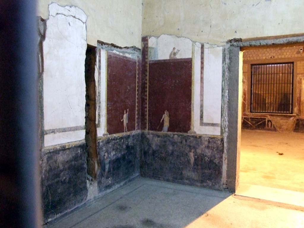 Castellammare di Stabia, Villa San Marco, December 2006. Room 30, south-east corner with painted figures. On the left is the doorway to room 50, on the right is the doorway to room 53.
