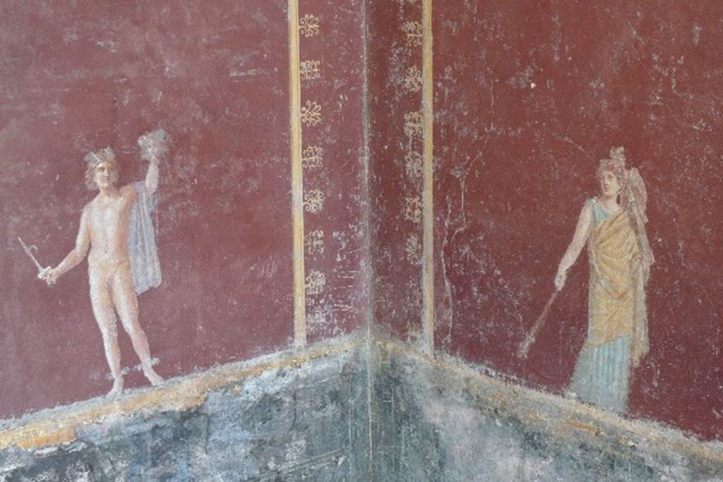 Castellammare di Stabia, Villa San Marco, July 2010. Room 30, south-east corner. Painted figures of Perseus lifting the head of Medusa, and Iphigenia with a palladium on her shoulder and torch in her hand. Photo courtesy of Michael Binns.