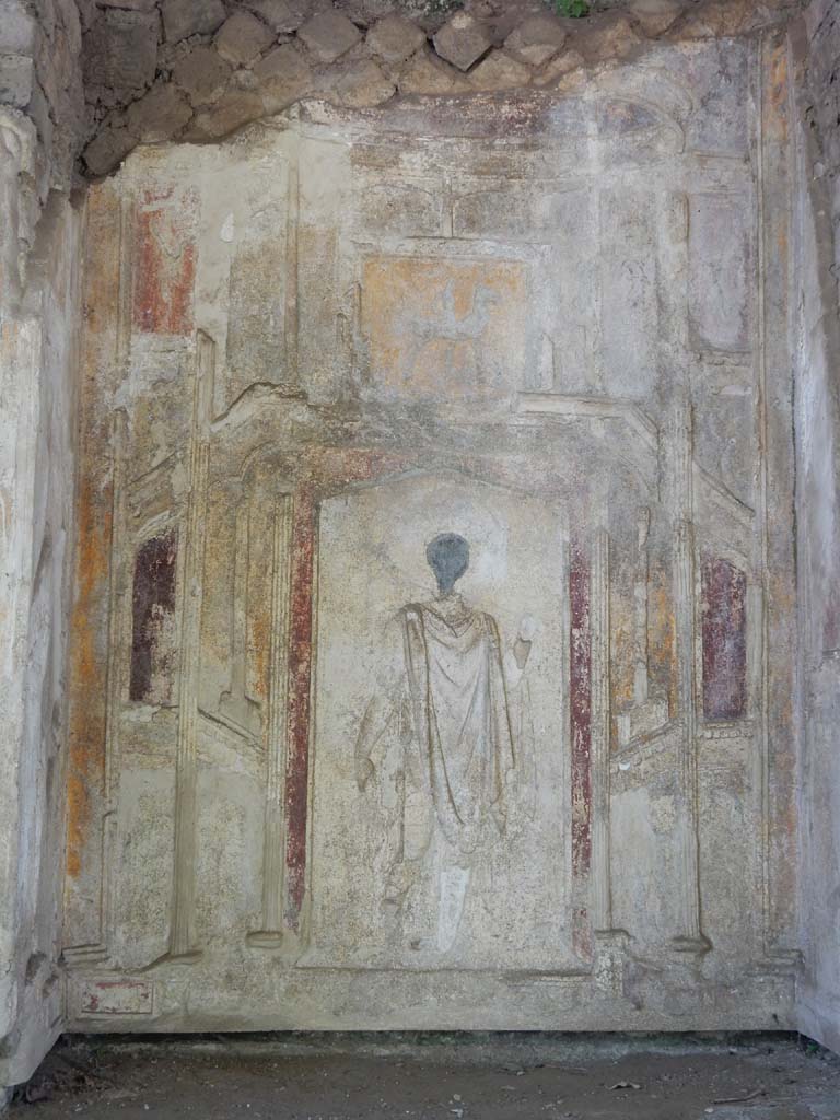 Villa San Marco, Stabiae, June 2019. Area 64, stucco relief in niche 8 showing the hunter.
Photo courtesy of Buzz Ferebee