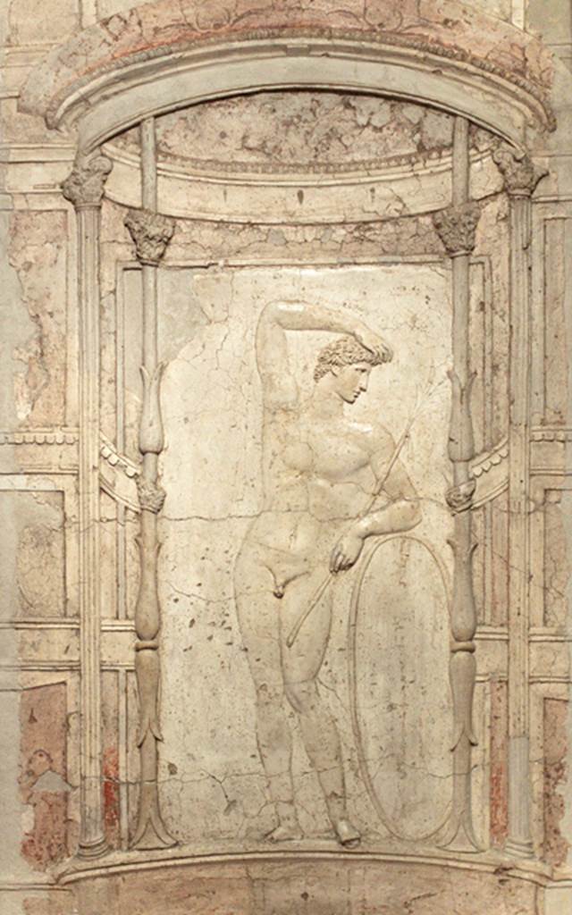 Castellammare di Stabia, Villa San Marco. Room 65, stucco relief of athlete from lower wall of niche 7 of the nymphaeum. Now in Naples Archaeological Museum. Inventory number 9578.
According to Parslow, this stucco relief of a gymnast with a hoop was removed in August 1752, and taken to the museum at Portici. See Parslow, C.C. (1998). Rediscovering Antiquity: Karl Weber and the Excavation of Herculaneum, Pompeii and Stabiae. UK,Cambridge UP (p.178-9, fig.50). Underneath this was a painting of Diana and Acteon.