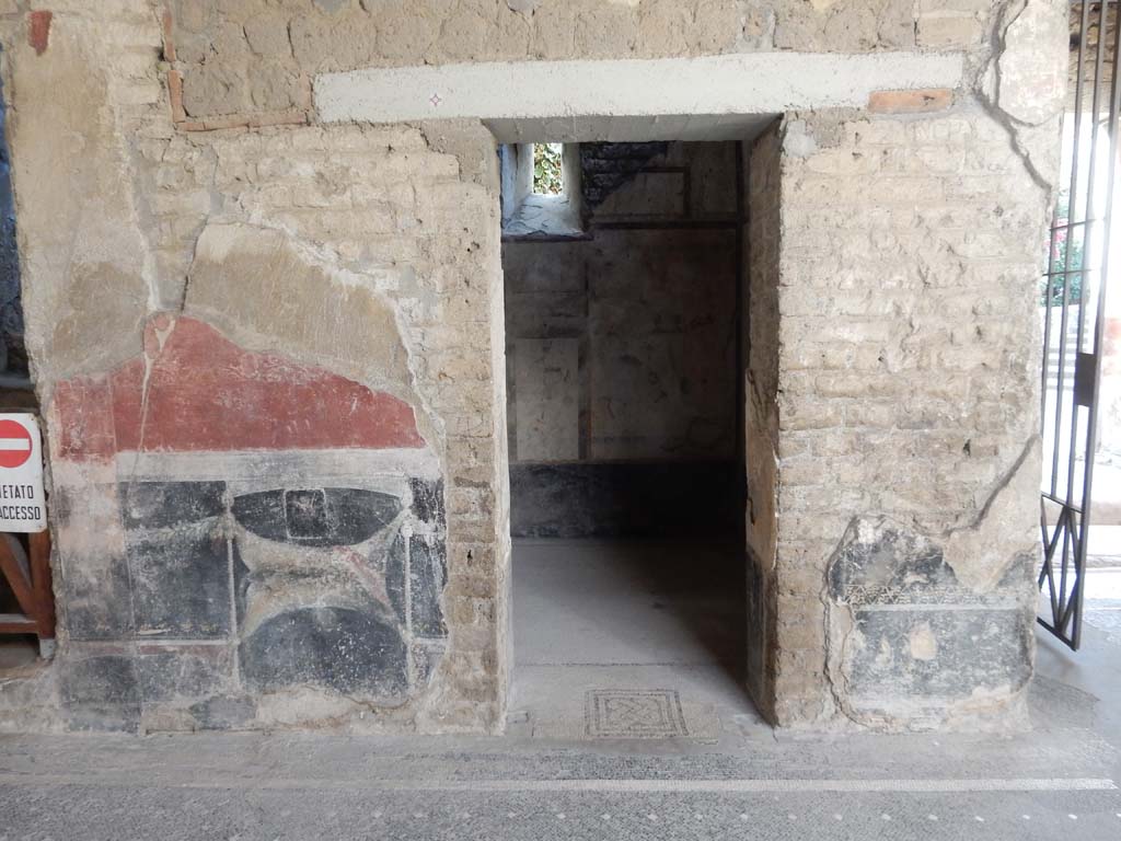 Villa San Marco, Stabiae, June 2019. Looking south to doorway to room 61, in south-east corner of atrium.
Photo courtesy of Buzz Ferebee.
