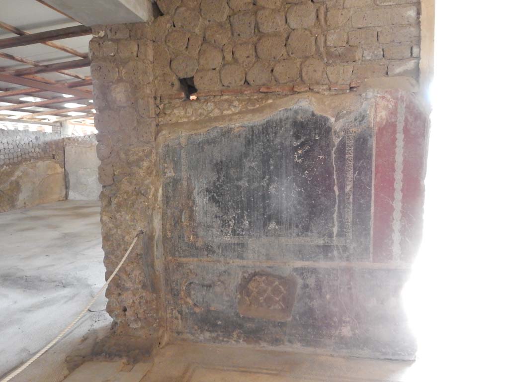 Villa San Marco, Stabiae, June 2019. Room 35, east wall at north end, with doorway to room 48, on left.
Photo courtesy of Buzz Ferebee
