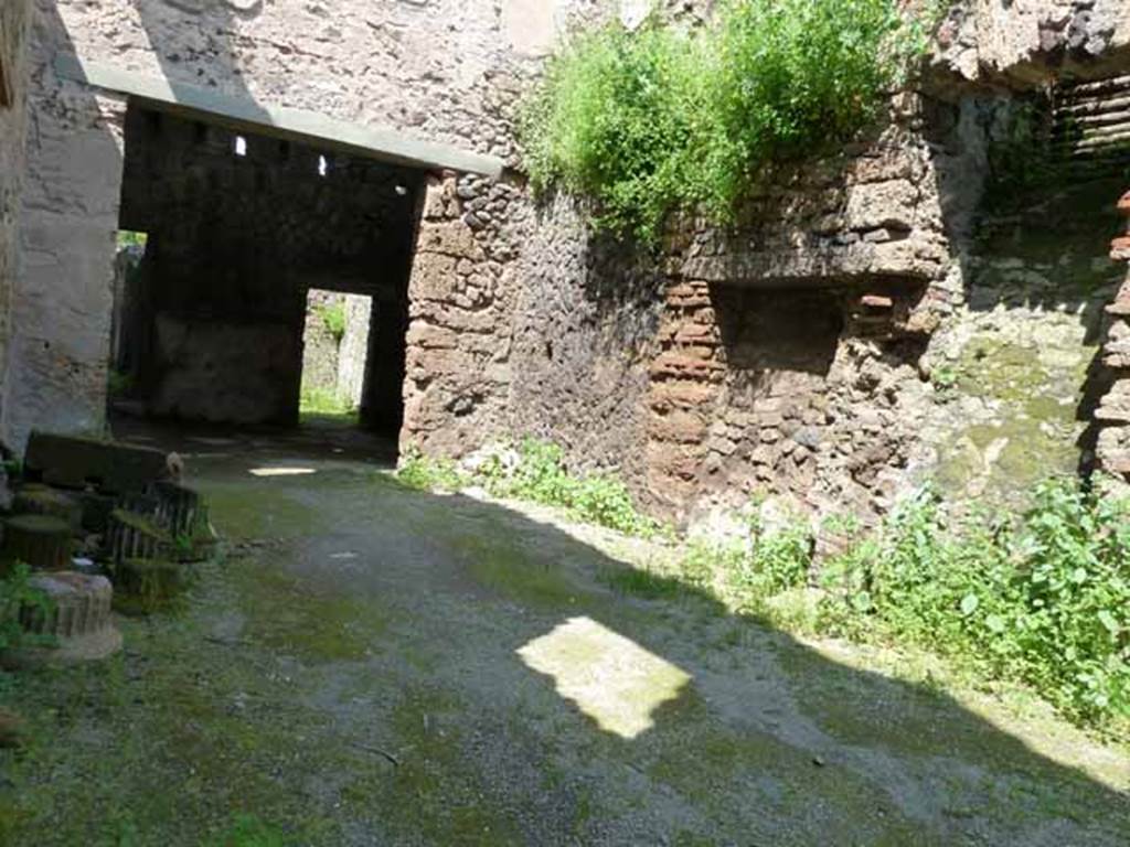Villa of Mysteries, Pompeii. May 2010. Room 59, north and east sides. The two unexcavated entrances in the east wall are the doorway to room 58, and the staircase.